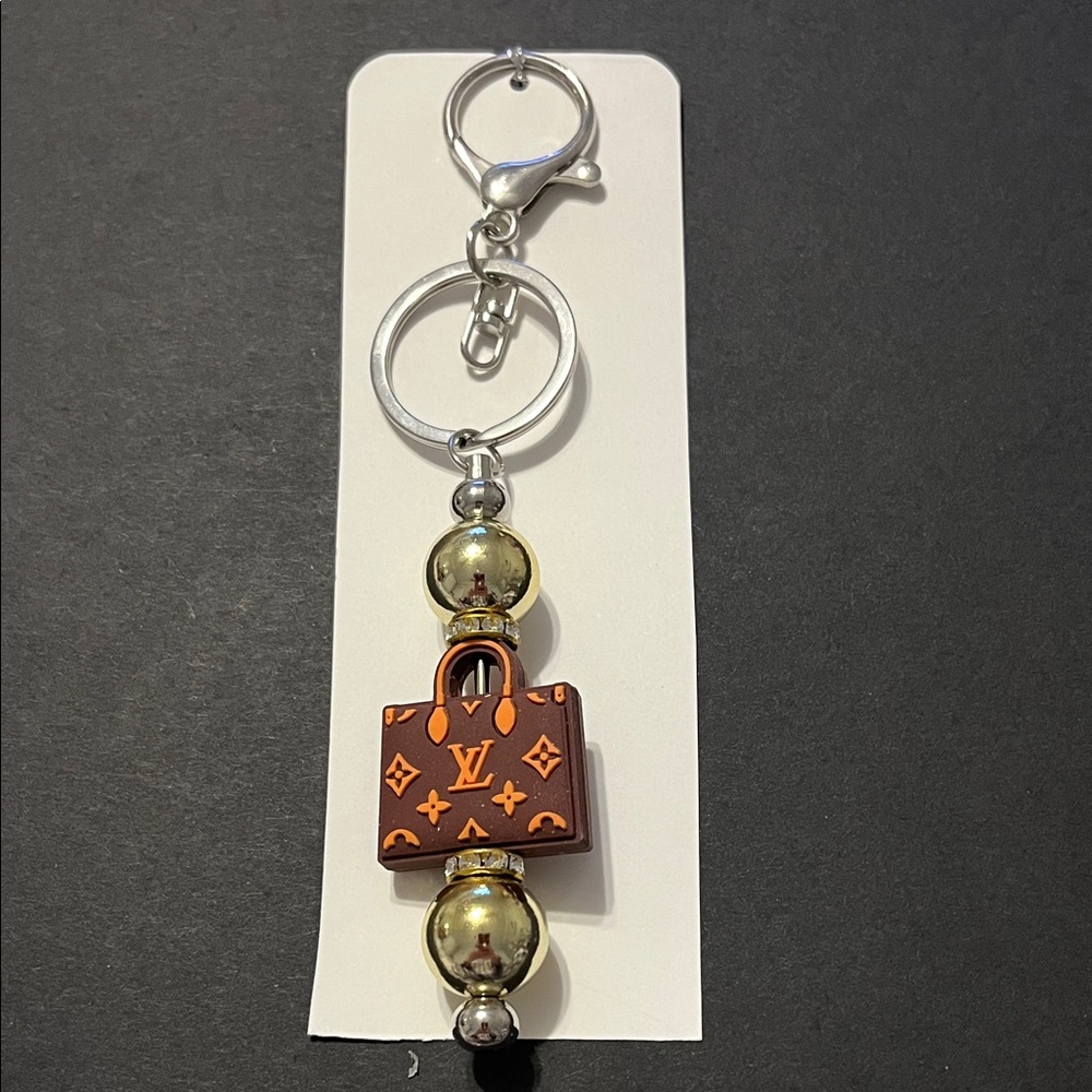Fashionista keychain. $10